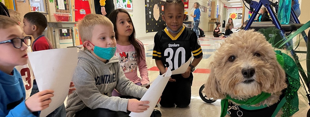 PAWS Therapy Dogs Visit Students for Read Across America Week