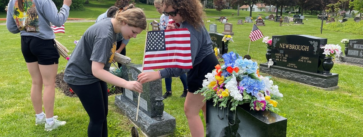 McKinley High Students Place Flags and Medals at Veterans&#39; Gravesites