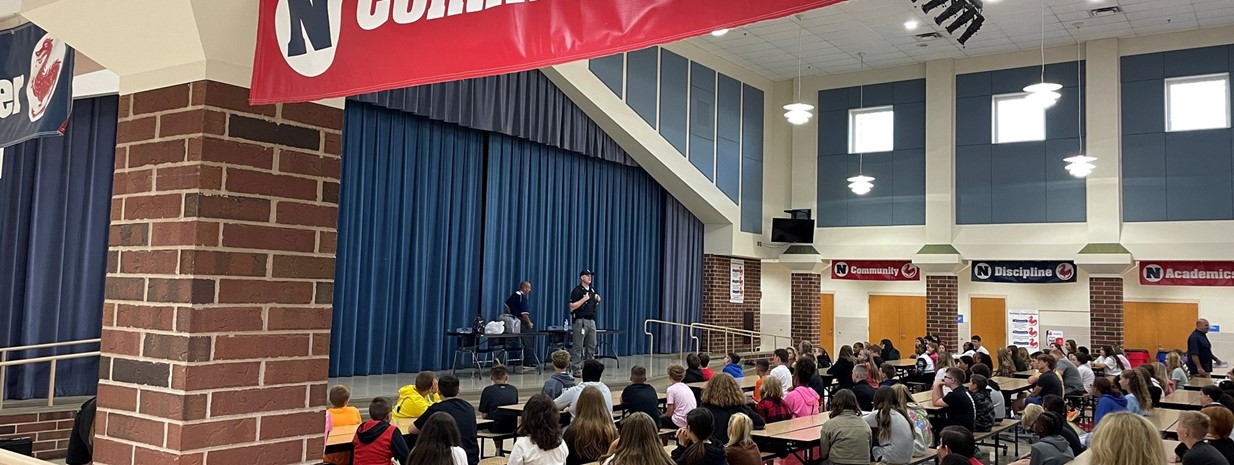 SRO Corll speaks to 6th graders