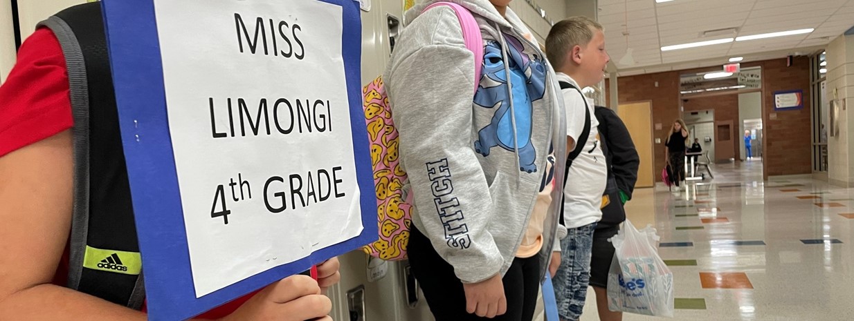 Students wait for fellow classmates on the first day!
