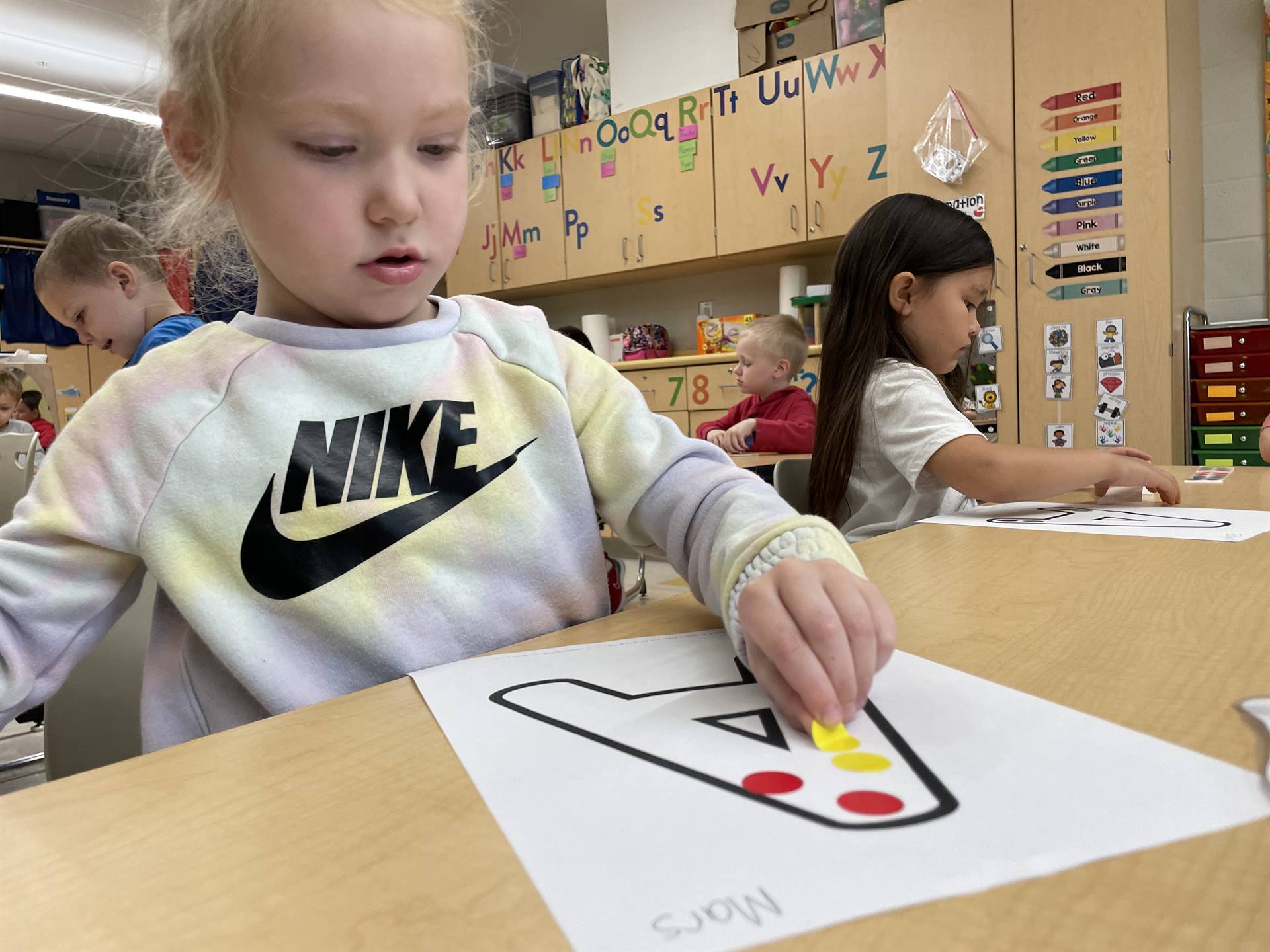 Sticker art improves fine-motor skills