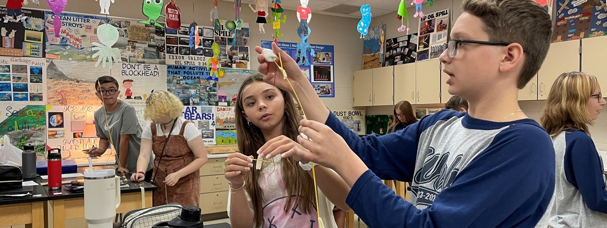 Students work to create the tallest spaghetti tower that supports a marshmallow!